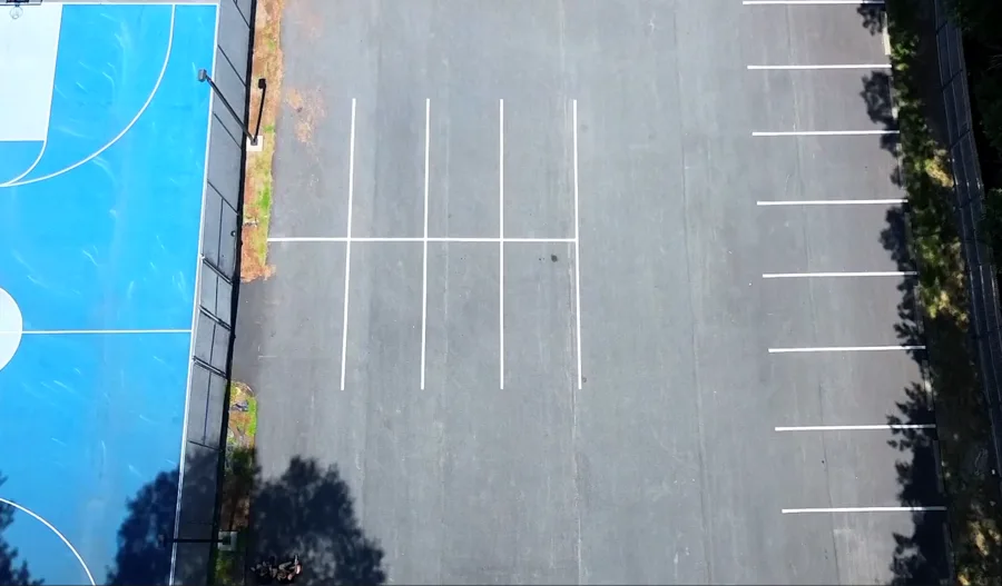 Commercial lot with faded markings and surface wear