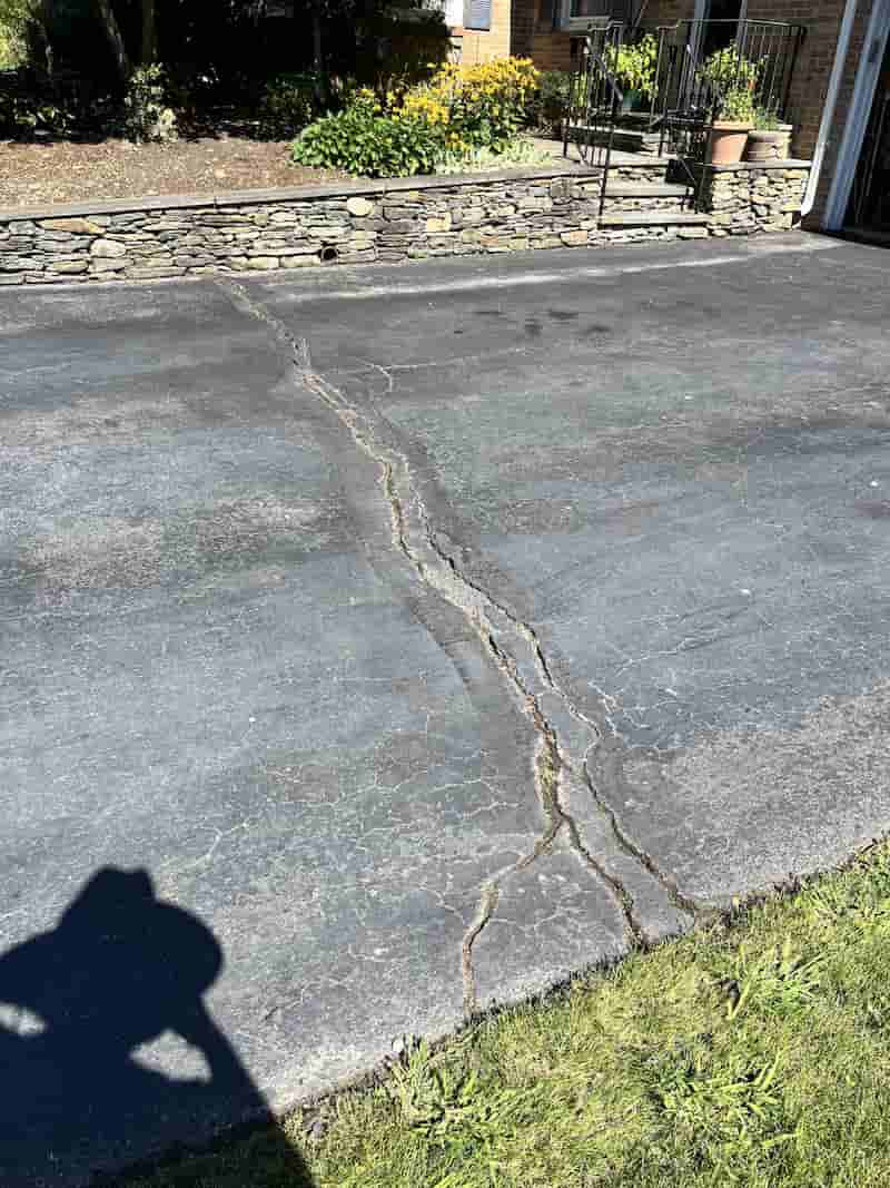 Before: Driveway crack filling - Lincoln, RI