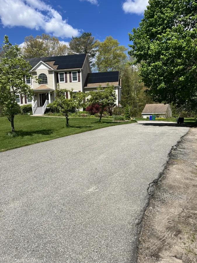 Oxidized faded driveway before sealcoating