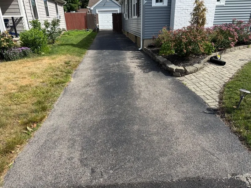 Residential driveway showing surface deterioration