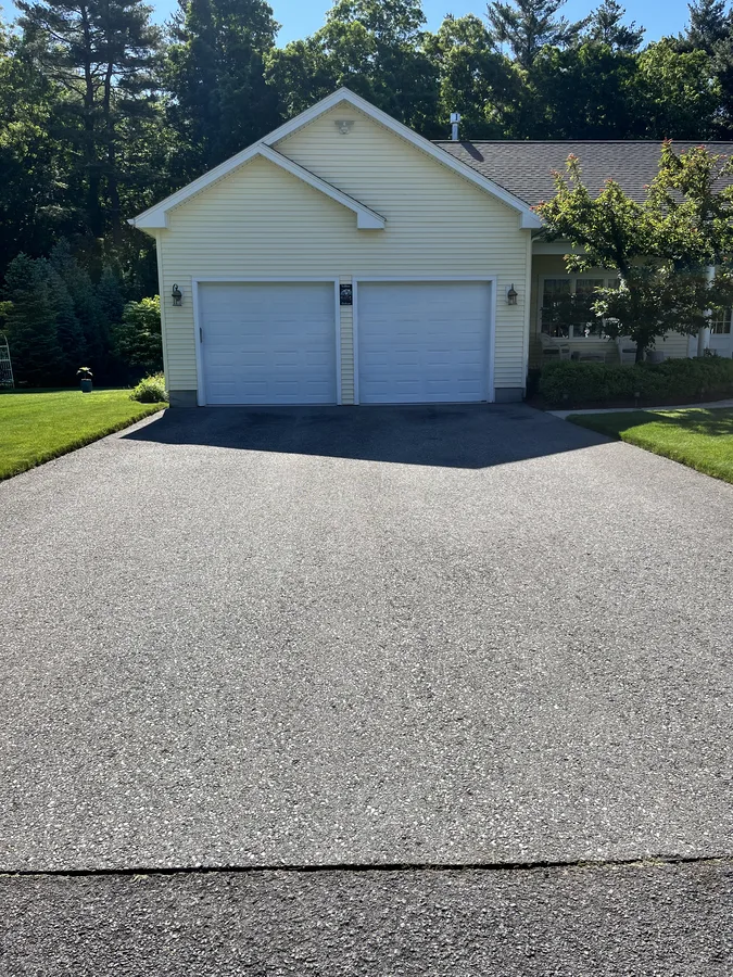 Cracked apron and UV-faded driveway surface