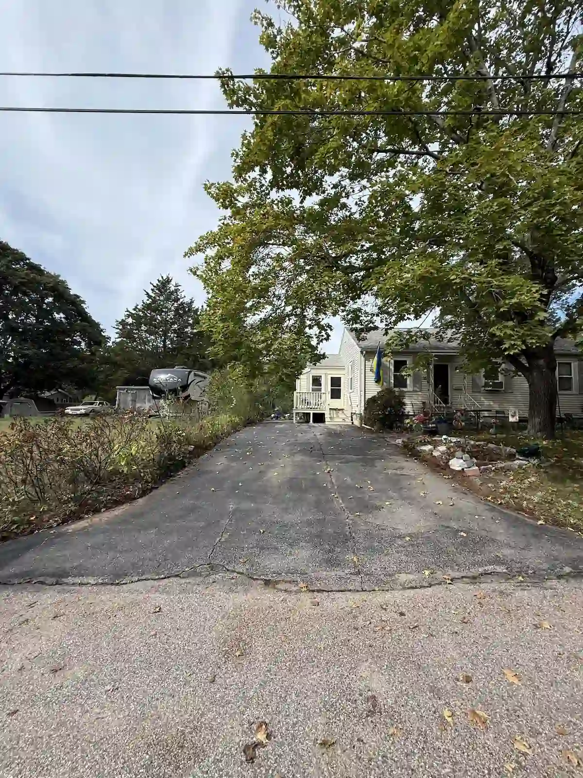 Before: Residential driveway sealcoating - East Providence, RI