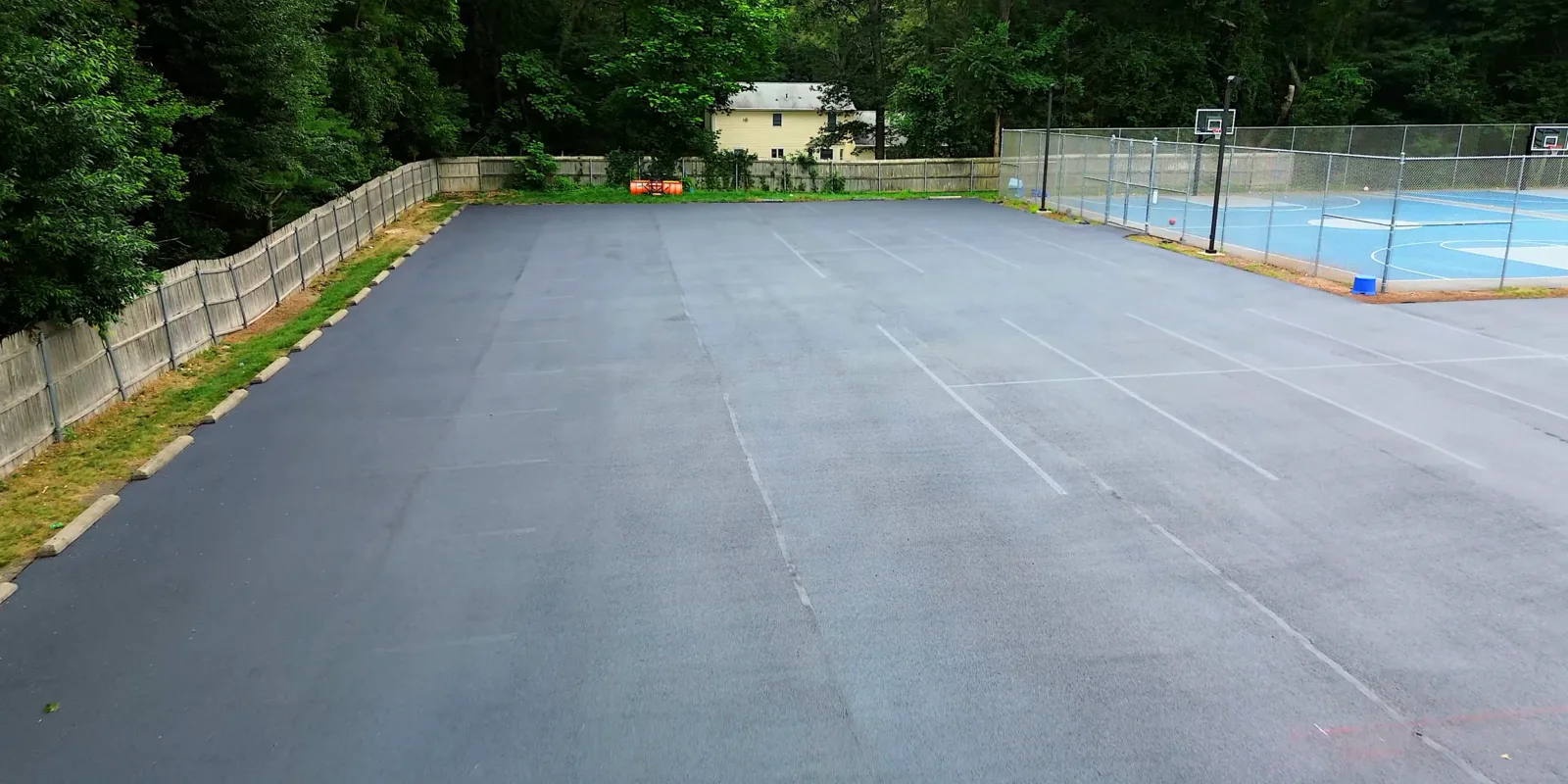 Sealed commercial parking lot with fresh striping
