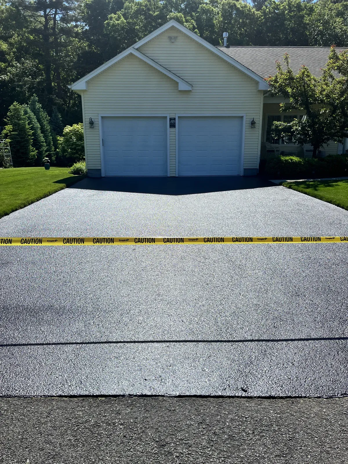 Freshly sealcoated residential driveway