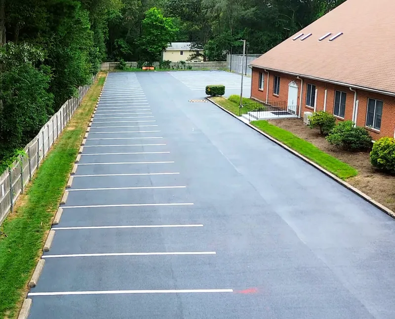 Completed parking lot with crisp fresh line striping at angle
